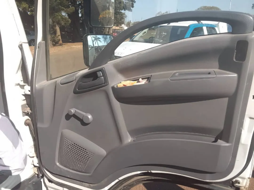 The open driver’s door of the Isuzu truck during the search